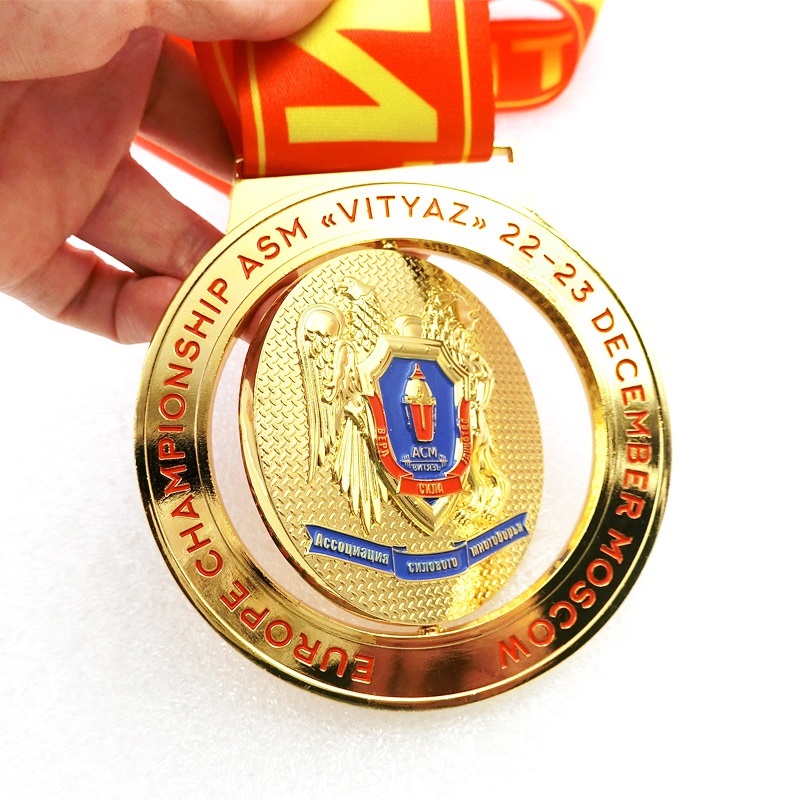 Own designs gold metal spin medal with enamel